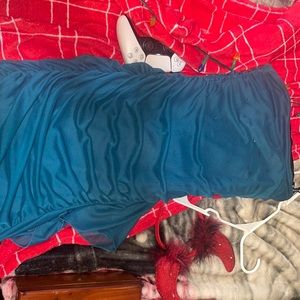 blue strapless dress with ruffles at the bottom